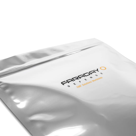 The American Reserves 15pc 7.0 Mil Faraday EMP Kit, featuring zip-lock closure and a white background, provides robust electromagnetic radiation protection.