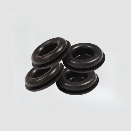 Four Berkefeld Stainless System Blocking Plugs by American Reserves, BPA-free and made of black rubber, are stacked on a plain white background.