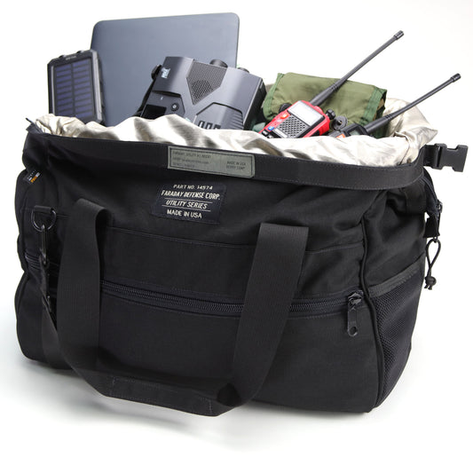 The American Reserves CORDURA® Utility Bag Large opens wide to reveal essential electronic gear, including a solar panel, binoculars, radios, and a laptop. This sturdy bag ensures youre ready for any adventure or task.