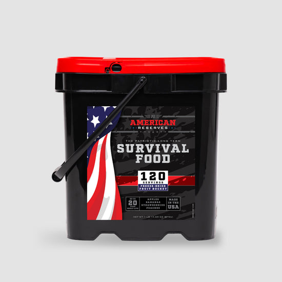 The 120 Serving Freeze Dried Fruit Bucket by American Reserves is a black and red bucket featuring an American flag design. It offers 120 servings of apple-flavored drink mix, boasts a 20-year shelf life, and is proudly made in the USA.