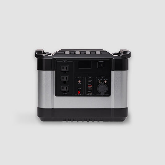 The American Reserves Generator and Solar Panel Bundle is silver and black with a high-quality lithium battery, multiple outlets, and a front digital display for reliable portable power.