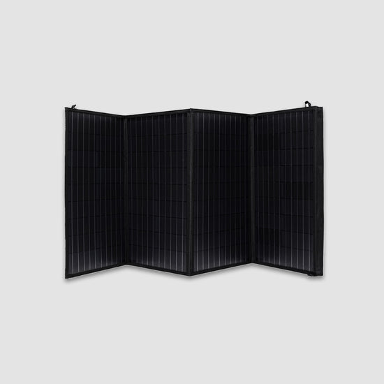 Displayed against a plain background, the American Reserves 100W Solar Panel combines portability with solar efficiency in a compact and lightweight four-panel folding design.