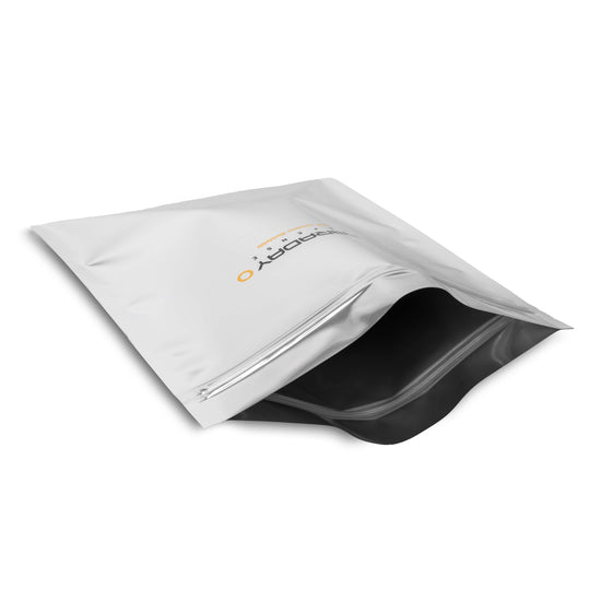 A partially opened 7.0 Mil Faraday Cell Phone Bag from American Reserves, silver with a black interior and resembling Faraday bags, offers electronic shielding on a white background. Comes in a 5 x 7 size pack of three.