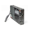 The Tecsun PL880 by American Reserves is a portable radio with a PLL dual conversion world band receiver, SSB support, dynamic audio amplifier, handle, digital display, numeric keypad, tuning knobs, and boasts a rechargeable battery. It comes with a leather pouch and is shown from an angled side view.