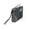 The Tecsun PL880 by American Reserves is a portable radio with a dynamic audio amplifier, world band receiver, extended antenna, digital display, control buttons, gray strap, and various side input/output ports.