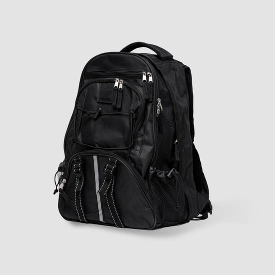 The American Reserves Red 64 Piece Survival Backpack features multiple zippered compartments, side mesh pockets, and two reflective stripes, ideal for carrying emergency gear. Its shown against a plain light gray background.