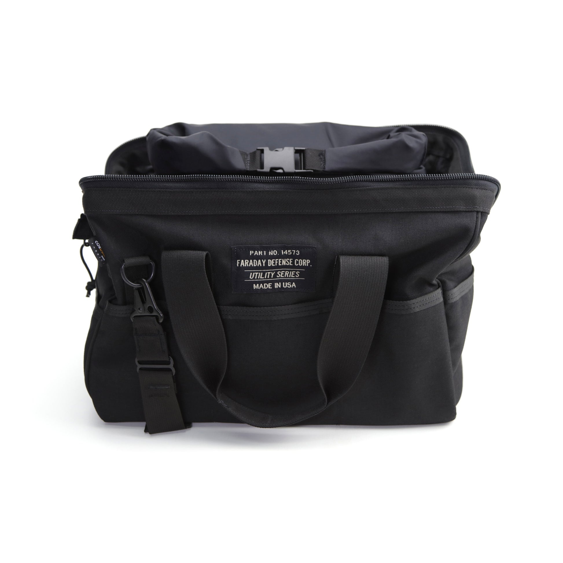 The medium black CORDURA® Utility Bag by American Reserves features dual handles, a front label saying Faraday Defense Corp, Utility Series, Made in USA, and a partially visible interior. This versatile pouch ensures signal blocking for enhanced security.