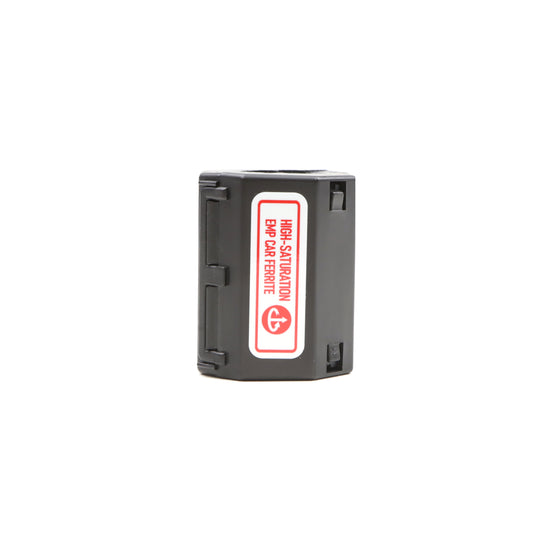 The DEFCON™ Vehicle + EMP Vehicle Protection Kit, from American Reserves, features a black high-saturation BMP capacitor with a red warning label on a white background for essential surge protection.