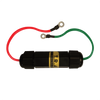 The DEFCON™ Vehicle + EMP Protection Kit by American Reserves is a cylindrical device with a black casing labeled TRA, featuring red and green wires with looped ends, expertly safeguarding vehicles against electromagnetic pulse interferences.