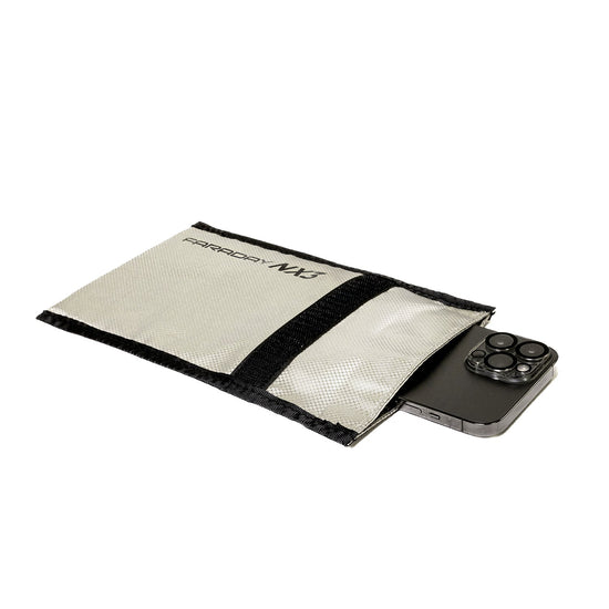 A smartphone is partially tucked into a sleek gray fabric pouch with black trim labeled American Reserves, offering premium anti-hacking and EMF shielding.