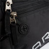 Close-up of American Reserves black Faraday Waist Pack featuring metal zippers, a plus-sign logo, part of a logo in white letters, and RFID blocking for added security.