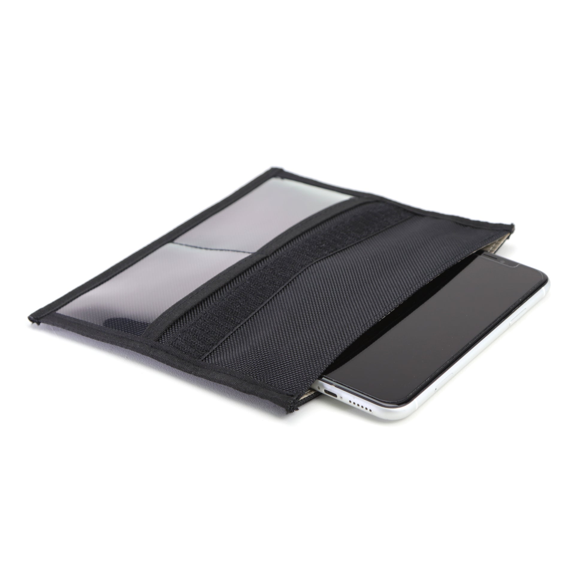 A black pouch with a smartphones edge visible, this ultimate shielding solution acts as the American Reserves XXL Forensic Faraday Jacket Kit for device protection and signal blocking.