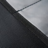 Close-up of two textured black fabrics from the XXL Forensic Faraday Laptop Jacket by American Reserves: one has a checkerboard pattern similar to RFID-blocking materials, while the other is smooth and plain.