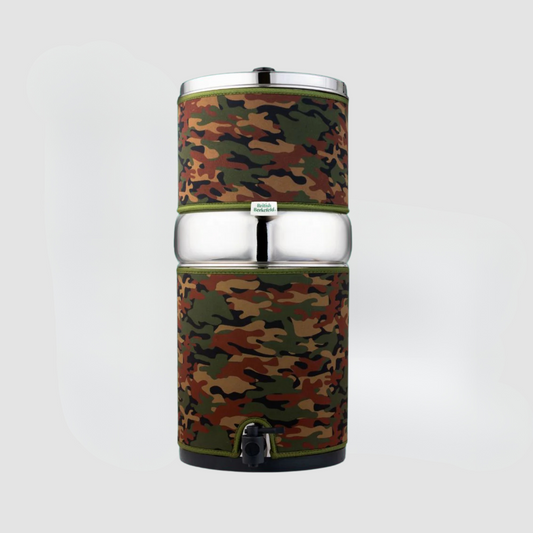 The Insulating Gravity System Sleeve by American Reserves, featuring a camouflage pattern and stainless steel band, is ideal for outdoor adventures, showcased against a plain grey backdrop.