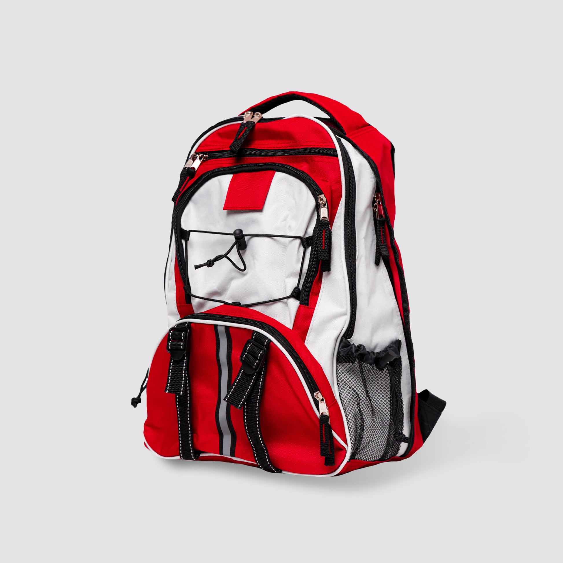 The Red 64 Piece Survival Backpack by American Reserves features red and white design, black zippers, multiple compartments, a spot for your portable stove, and adjustable straps.
