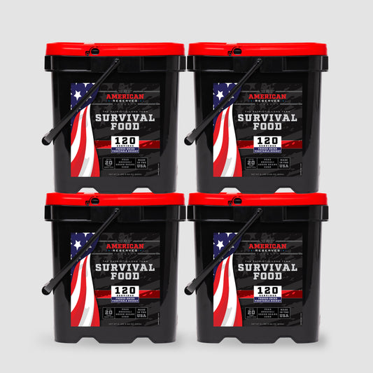 Four 480 Servings Freeze-Dried Veggie Bundle buckets by American Reserves, black and red with an American flag design, are displayed on a light gray background. They promise a long shelf life and show off their 120 servings each in a square formation.