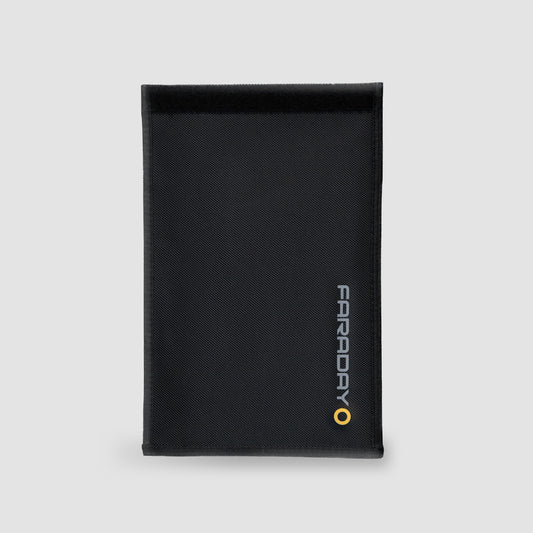 The XL Forensic Faraday Jacket by American Reserves is expertly crafted with signal-blocking technology for device protection and comes in black on a light gray background.